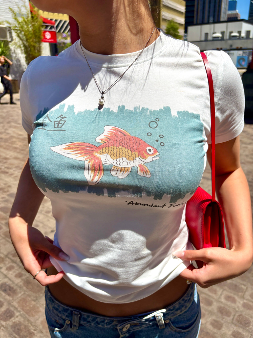 Abundant Fortunes Women's Baby Tee