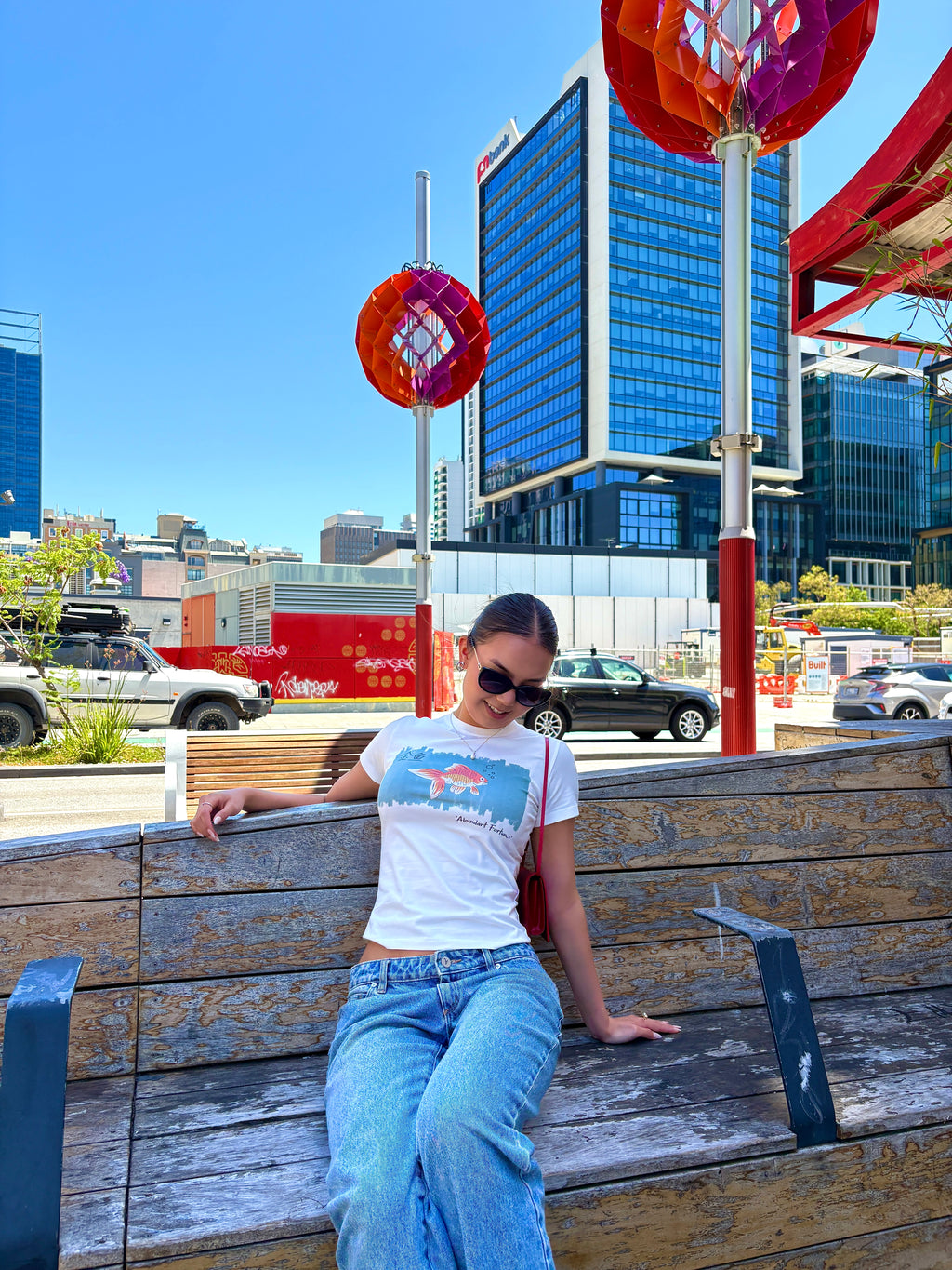 Abundant Fortunes Women's Baby Tee